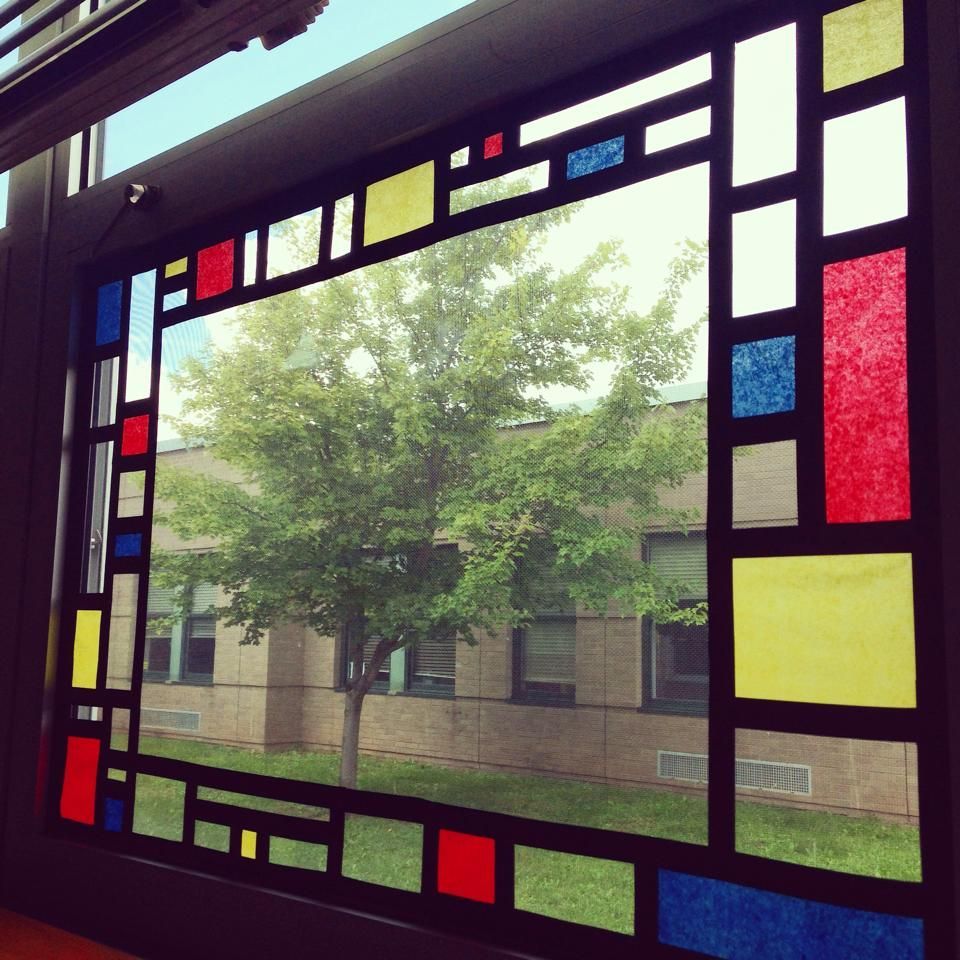 Mondrian windows with tissue paper and black electrical tape – what a creative, educational way to liven up the room!