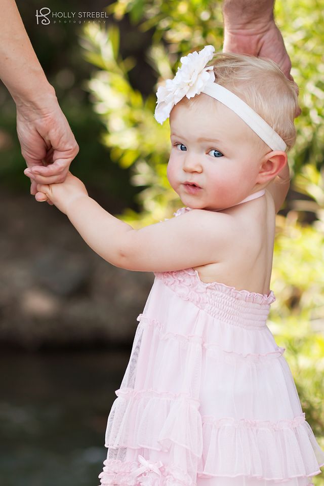 Picture idea #5. Also want to do her one week photo and one year photo holding mine and Daddys fingers.