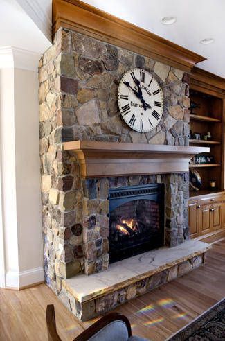 Ravenwood mastercut natural veneer stone fireplace |  love the multi-level stone, wood mantal, molding and hearth