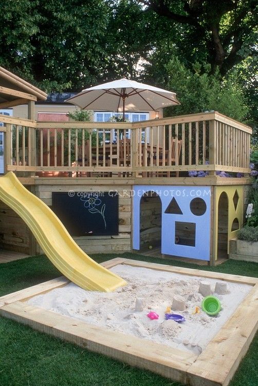 Slide on the deck…what a great idea to help make a kid friendly yard!