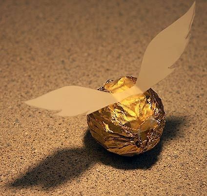 Snitch made from ferrero rocher chocolates-geez where was this idea when I had Simons Harry Potter party a couple of years ago.