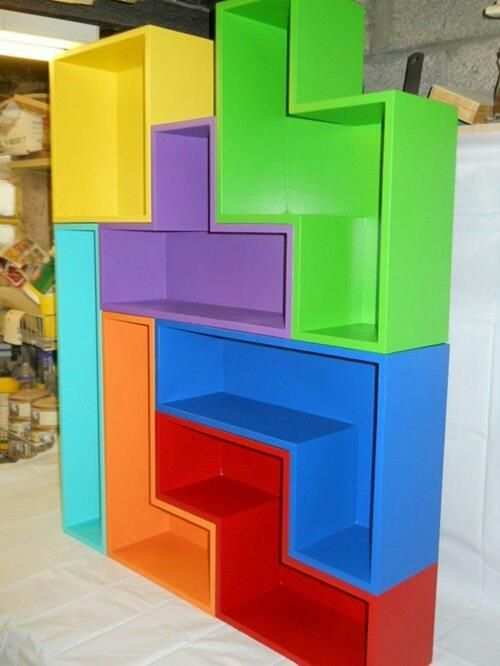 Tetris book shelves!  Game room here I come! I will purchase tetris lights too. And pillows… Hmm, is tetris themed too much?