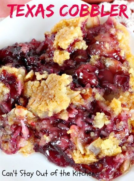 This Dump Cake recipe is made with blueberry and cherry pie fillings, crushed pineapple, almonds, coconut, a ...