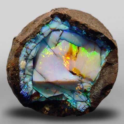 This Ethiopian opal makes me want a chocolate, creme-filled Cadbury Egg.