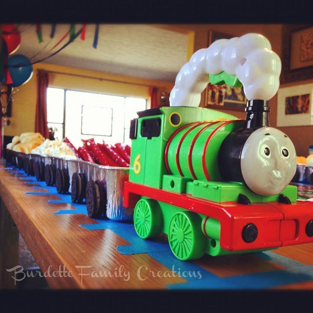 Thomas the Train Birthday Party — awesome ideas!!!  Blue painters tape for track; use images and toothpicks as cake toppers.