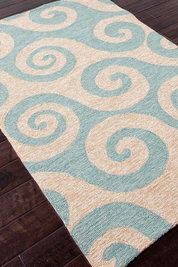 “Wave Hello” rug from the Coastal Living collection of indoor-outdoor rugs by Jaipur. (also available in dark blue)