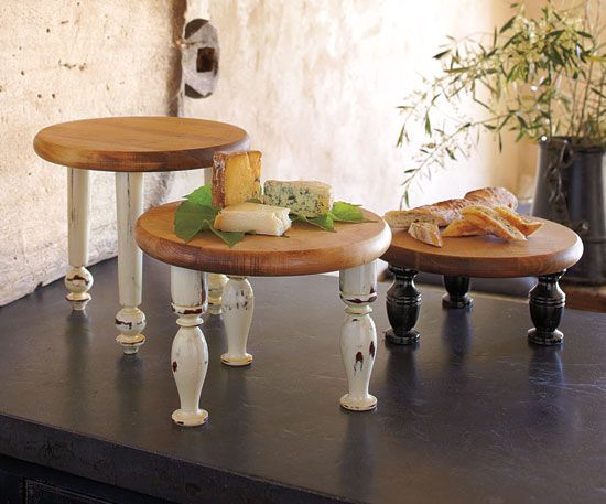 Add cute legs to a cutting board! great for a buffet table different heights, or a cake stand!! CUTE!