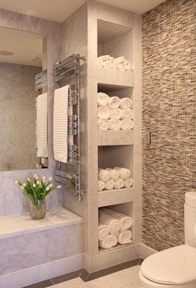 Bathroom with shelves for towels – feels like a spa! If we cant add a tub to second guest bath, would love to make the shower