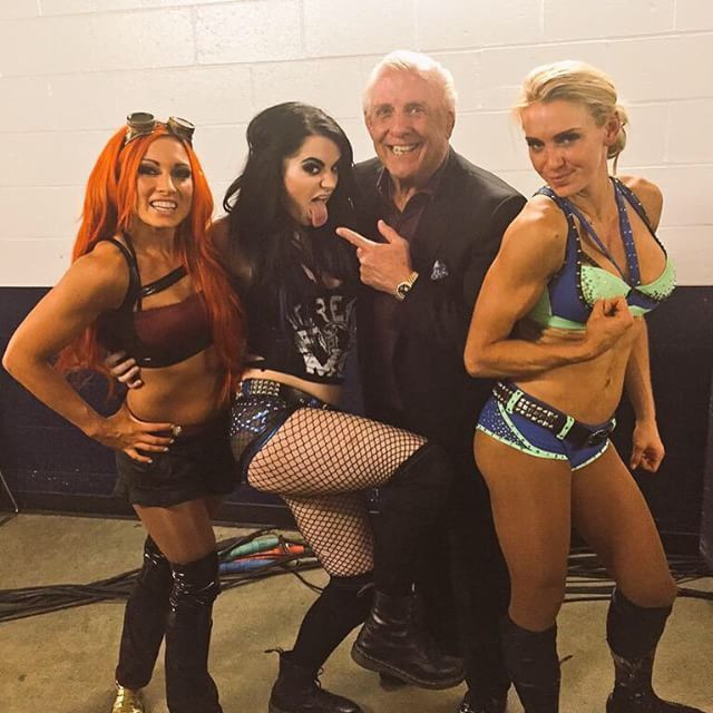 Becky Lynch, Paige & Charlotte (with Ric Flair)