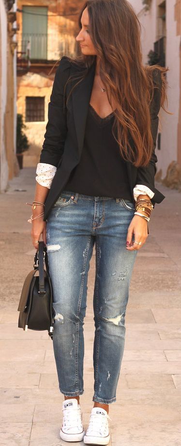 Black blazer over a black blouse with distressed boyfriend jeans and white converse sneakers | Street Style… Really like the