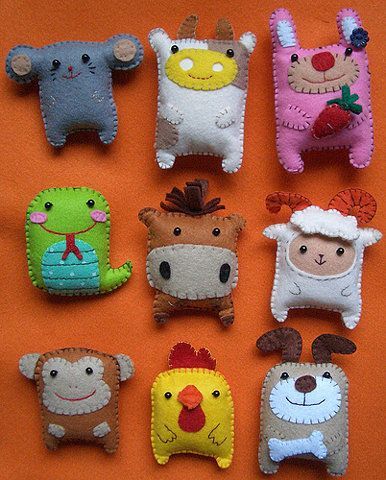 felt animals – could make parts of these for children to complete.  Reminds me of “Where the Wild Things Are” style.