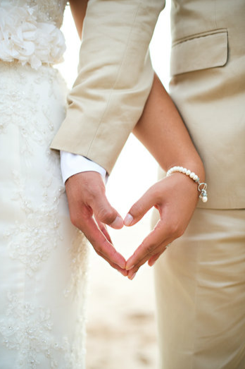 hands and heart photo idea – must have wedding day pose. I love when the groom has tan because its pure like the brides dress. It