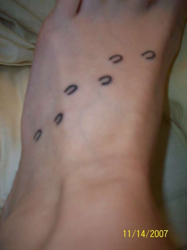 I like this ideas, with a horse head on my ankle and the horseshoes coming out of it with my kids names in them