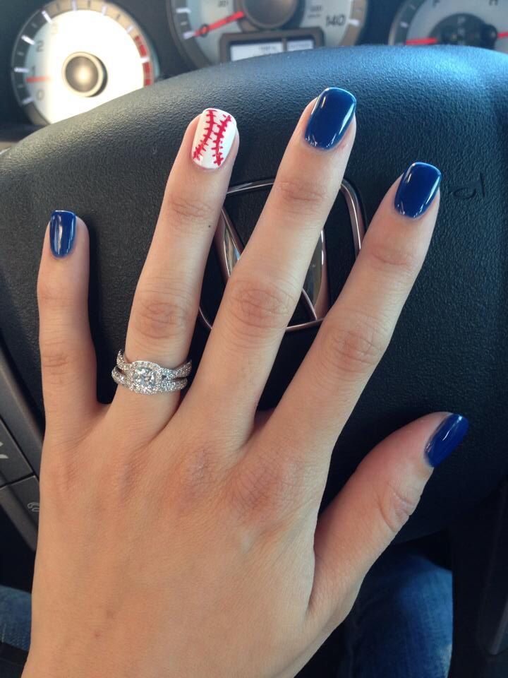 Im not crazy about blue nails but thats our color…this is what itd look like except Id angle the baseball stitching.