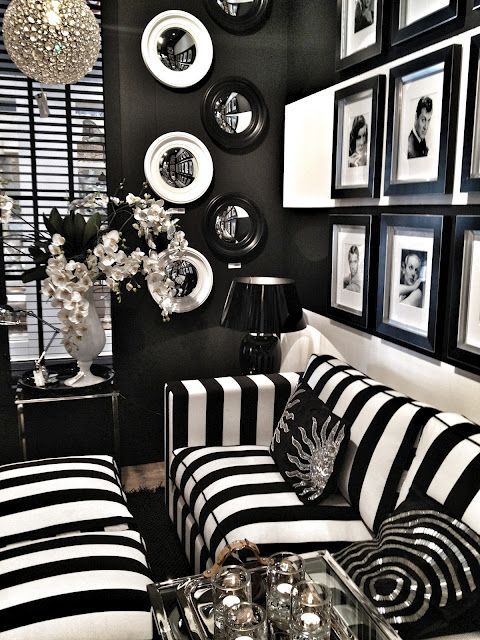Living Room ~ Black + white interior makes   a bold statement on a personal & artistic expression.