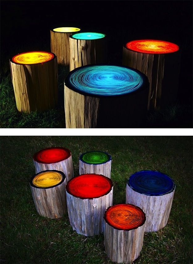 Log Stools painted with glow in the dark paint. What an easy way to spice up your backyard seating area or very cool for the