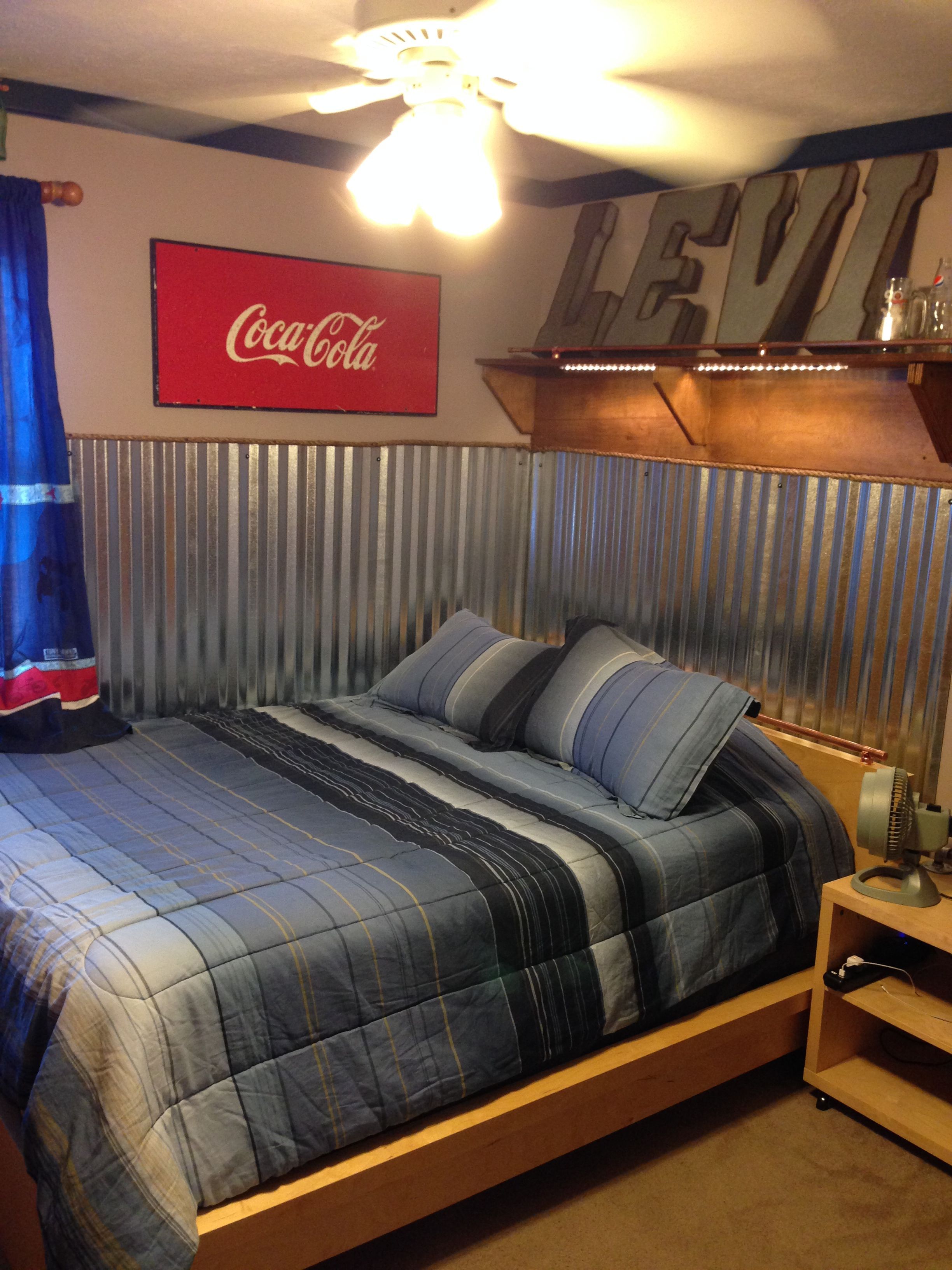 Love this room a good friend of mine designed and constructed.  Teen Boys room: industrial and coke, corrugated metal wainscoting