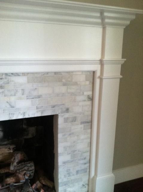marble tile fireplace if brick doesnt go all the way to ceiling…LOVE