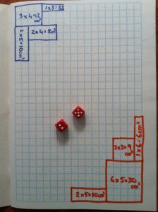 perimeter and area game; roll dice and race to cover the most board