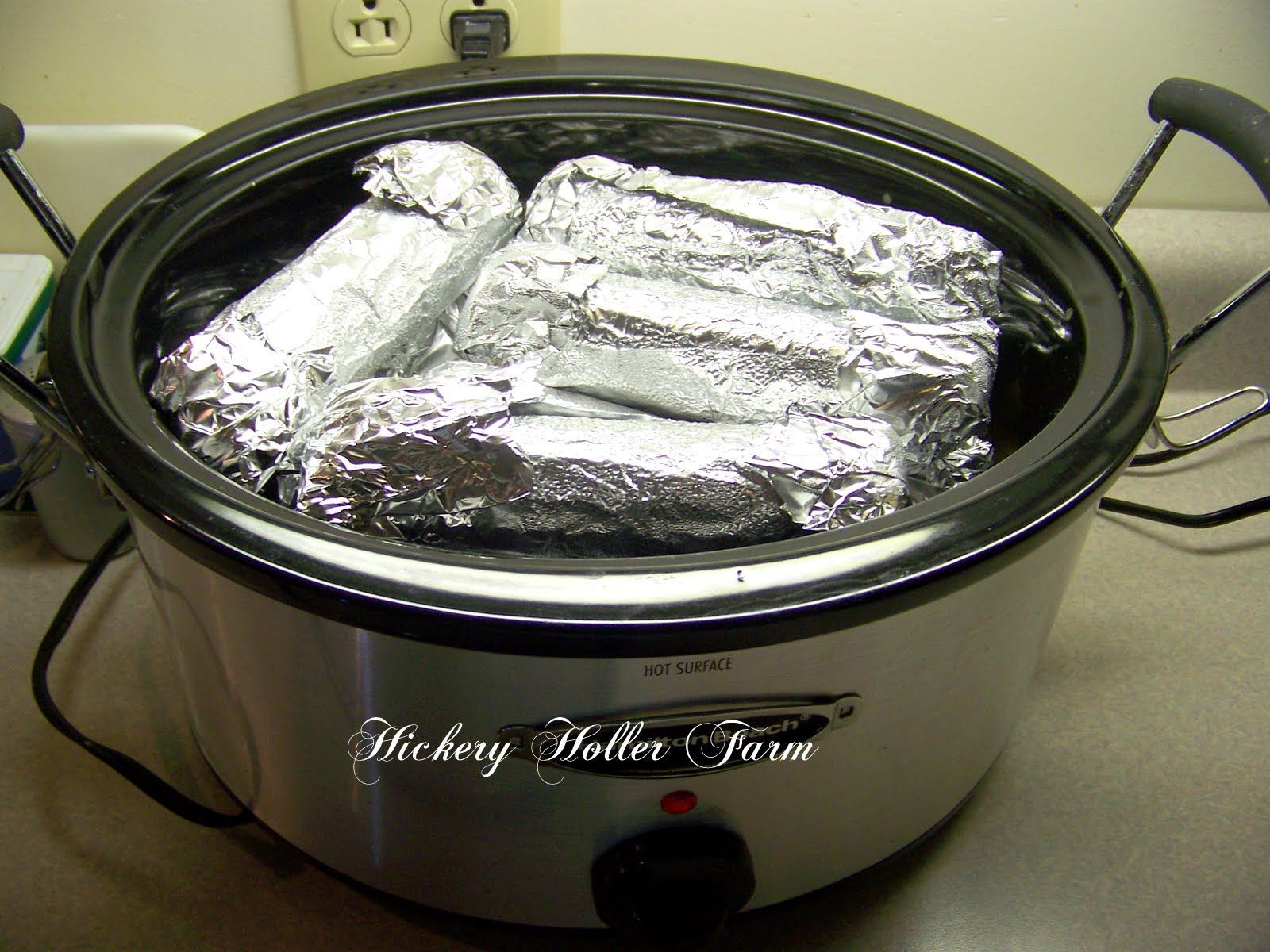 pork chops, baked potatoes and corn on the cob all in one crock pot for 6 hours