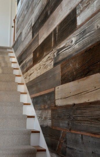 Reclaimed barnwood wall- basement stairs – love this idea for a spot that is hard to decorate.