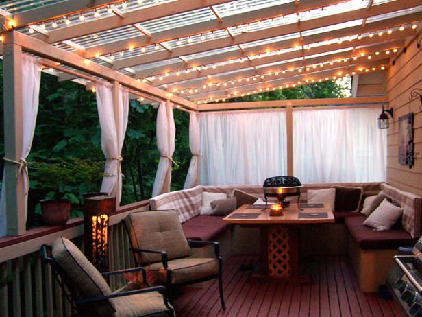 Some ideas here for the back patio and cover. I like the strings of lights, curtains on curtain rod, got to have a nice outdoor