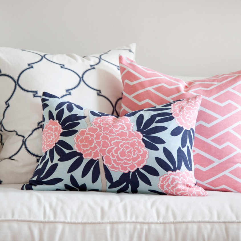 Summer Trends 2013: 60s Prep. Navy and pink preppy pillows in mixed patterns. The secret to mixing is to choose a color scheme,