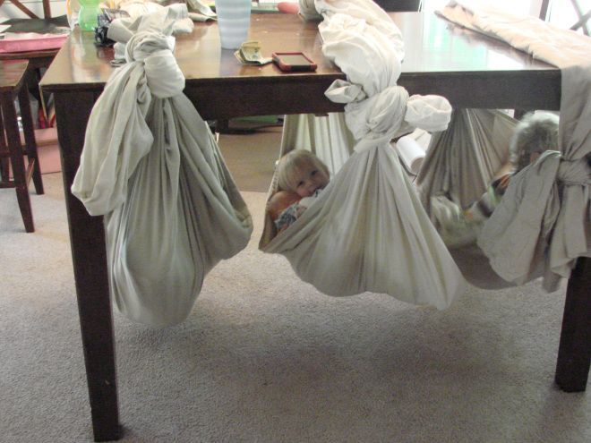 Table style swing.. Great for rainy or sick days!! my kids had a blast playing for well over 1.5 hours!
