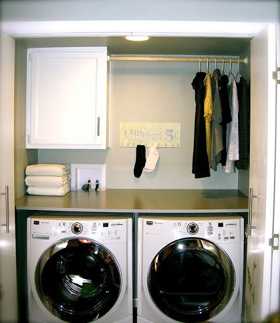 This would be perfect in my small laundry space love the bar for hang dry items!