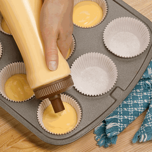 Use an old ketchup bottle to fill your cupcake pan with no mess.