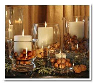 What a simple and elegant way to create autumnal ambiance! Bet I could find those glass holders at the Dollar Tree, no less.