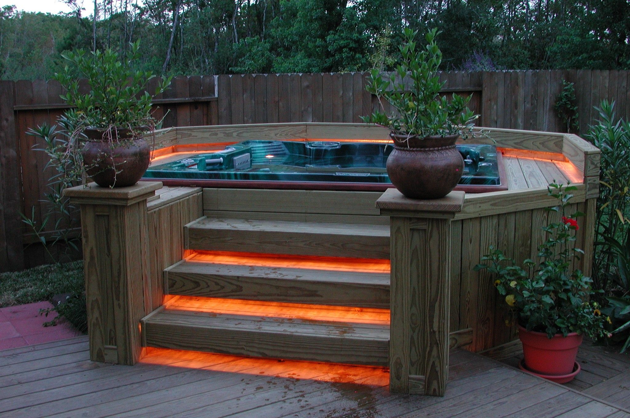 wooden hot tub deck idea instead of in ground.