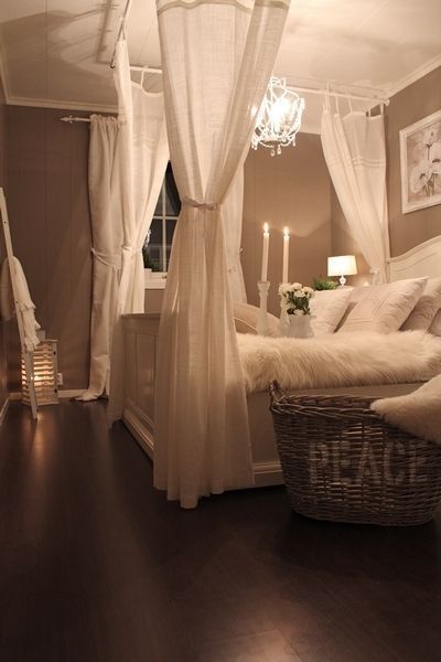 A Romantic master bedroom… love the idea of hanging the curtain rods from the ceiling… makes the bed such a cozy getaway for