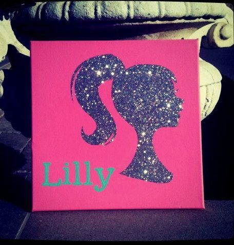 Adorable idea for a little girl’s room! Personalize a piece of (cheap and DIY) art with a Barbie-style silhouette and name.