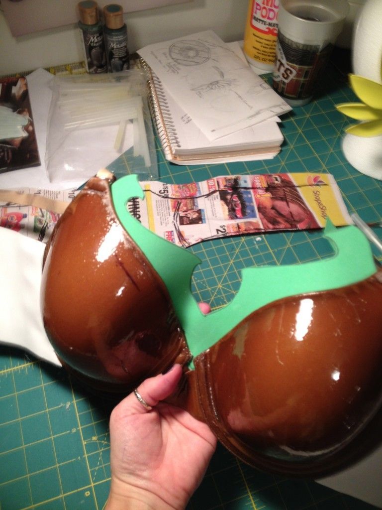 Bra to Breastplate using clear casting epoxy, paint, craft foam and paperclay.