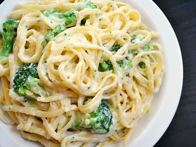 Broccoli fettuccine alfredo – added roasted red peppers and topped with grilled chicken. Yummy!