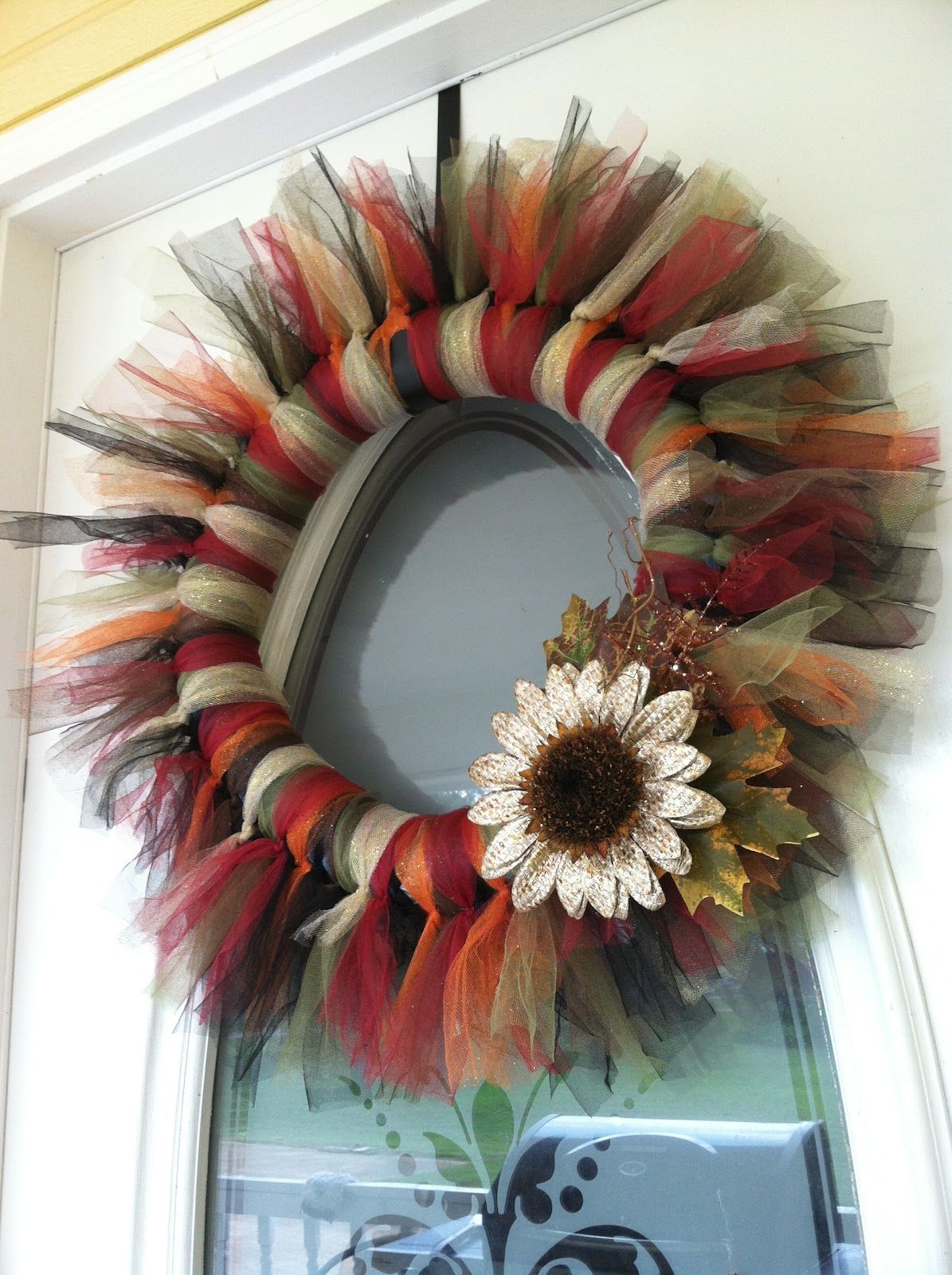 Candice Craves: Making a Tulle Wreath (fun noodle duct-taped, wrap noodle with ribbon/fabric before tulling) — use different