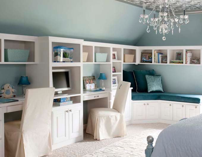 Custom cabinetry creates space for kids to do homework or sit and read a book, while providing lots of storage. Slipcovered