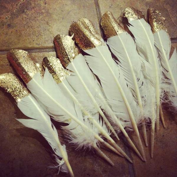 DIY feature vintage wedding decor – could dip white feathers 1/3 way up in black, then once dry, dip tiny edging on top and sides