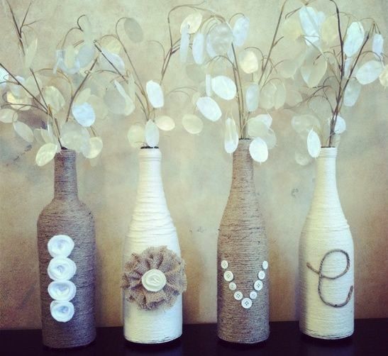 Diy Home decor ideas on a budget. : Upcycling – wrap old wine bottles in twine and yarn. Decorate with applique and buttons.