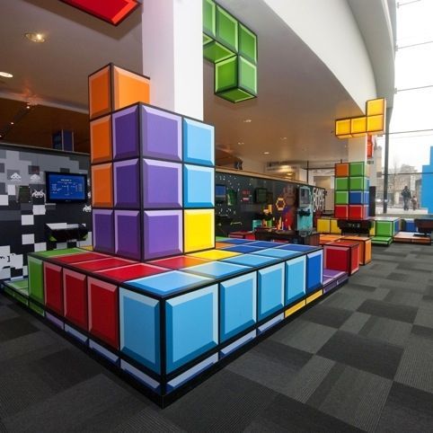 Games Lounge – National Media Museum in Bradford. Tetris style decor, awesome retro interior design.