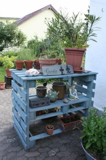 Garden shelf made from pallets.  This kind of thing would be brilliant in my garden as it would be too high for the rabbits to get