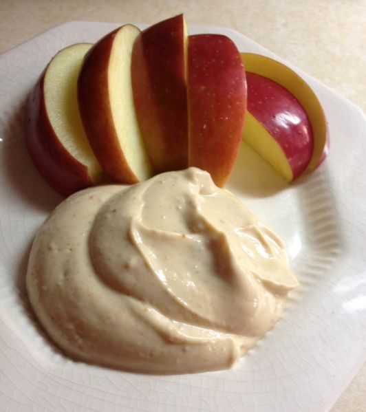 Greek yogurt, peanut butter, honey and cinnamon make a dip that will have your kids begging for an apple a day.