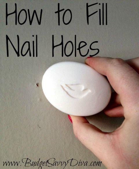 How to Fill Nail Holes  All you have to do is get a bar of white soap and scrub across the hole until its filled.  This is a great