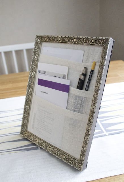 Keep papers and pens neat with an organizer made from an old frame. | 30 Ways To Instantly Transform Your Workspace
