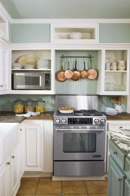 Kitchen Remodeling on a Budget. I like the microwave off the counter. Hmmm… Makes me think about something for our microwave…