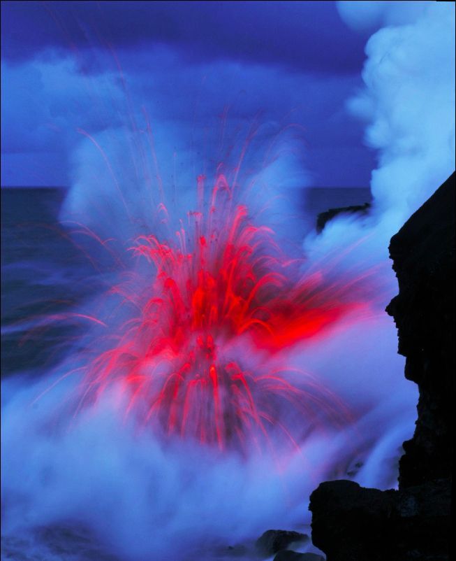 Lava –  looks like electric heat lit flowing streams that fell into the sea, than disappears  in a cloud of steam with a sizzling