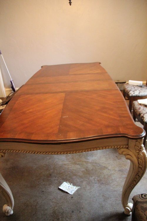 Love this look – it was an old beat up table, and she painted the bottom & stained the top. LOVE!
