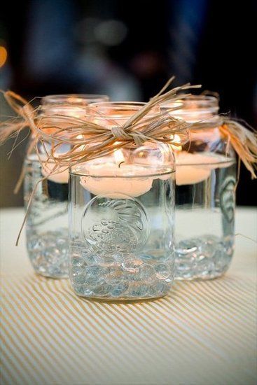 Mason Jar Centerpieces are ideal for adding laid back country charm to an outdoor wedding.