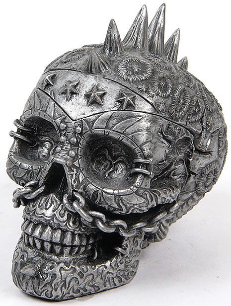 Metal skull. Skull is creepy but I like the detail in it maybe on something else.